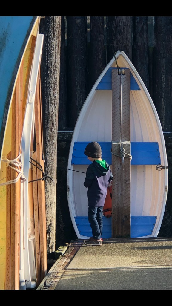 after-the-rain.org / Boy fishing at marina